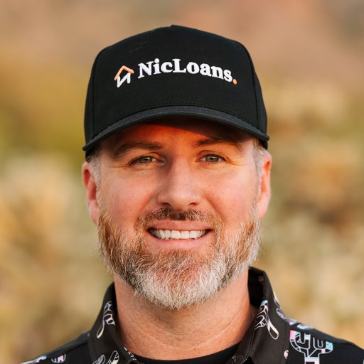Nic Feinstein, mortgage loan officer, smiling in a NicLoans cap